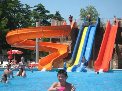a group of people in the water at a water park at Hotel Iskar & Aquapark - All Inclusive in Sunny Beach