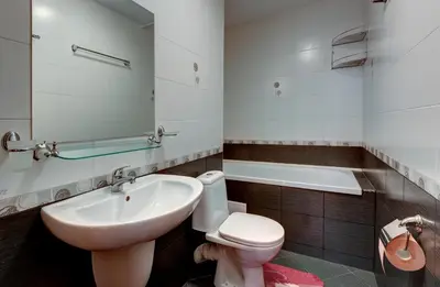 a bathroom with a sink and a toilet and a tub at ДриймБг Апартаменти - Райска Градина, Свети Влас in Sveti Vlas