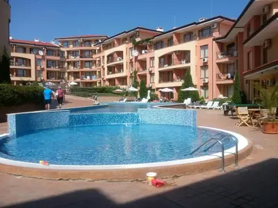 a large swimming pool in the middle of a building at Apartcomplex Panorama Dreams in Sveti Vlas
