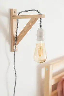 a light bulb hanging from a ceiling at Balabanov White in Varna City