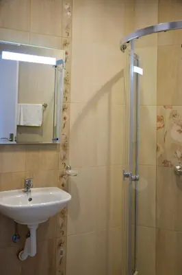 a bathroom with a sink and a shower at studio ASI in Obzor