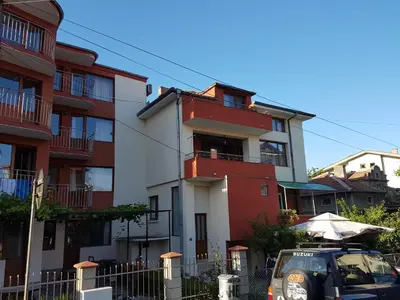 a car parked in front of a building at Guest House Galema in Obzor