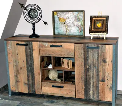 a wooden cabinet with a fan and a map on it at Boutique Villa Amalia in Chernomorets