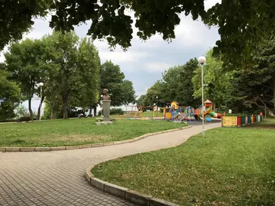 a park with a playground and a playground at ДриймБг Апартаменти - Панорама Бийч, Несебър in Nesebar