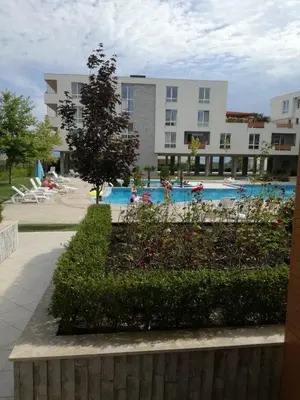 a view of a swimming pool in a building at Apartament Nora01 in Burgas City