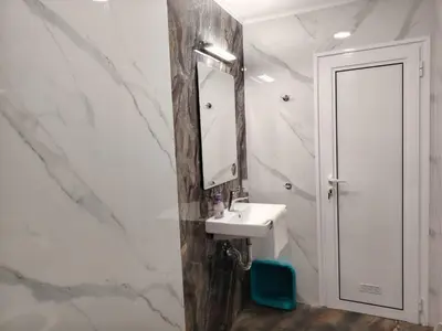 a bathroom with a sink and a mirror at Guest House Juja in Nesebar