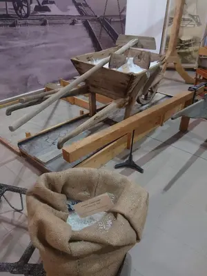 a wooden boat on display in a museum at Hristovi Apartments & Studios in Pomorie