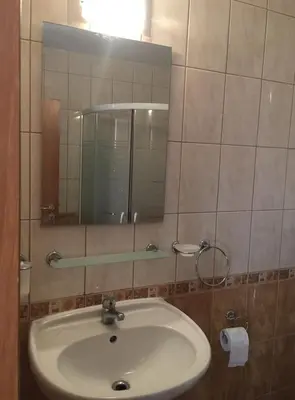 a bathroom with a sink and a mirror at Blue Summer in Sunny Beach