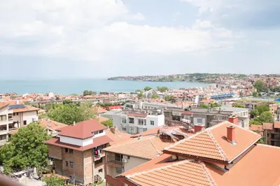a view of a city with buildings and the ocean at Ema Hotel in Sozopol