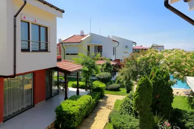 a view of a house with a garden at Saint Stefan Villas in Sozopol