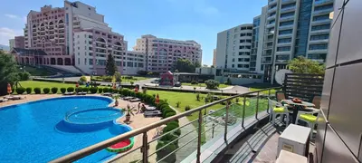 a view of a pool in a city with buildings at Menada Sunny Beach Plaza Apartments in Sunny Beach