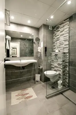 a bathroom with a sink and a toilet at Hotel Laguna Park Sunrise in Sunny Beach