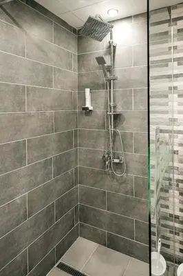 a bathroom with a shower with a glass door at Hotel Laguna Park Sunrise in Sunny Beach