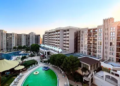 an aerial view of a resort with a pool and buildings at Royal Beach Premium in Sunny Beach