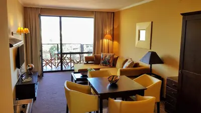 a living room with a couch and a table at Royal Beach Premium in Sunny Beach