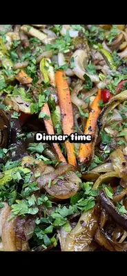a pile of food with carrots and other vegetables at Hotel Arsenal in Nesebar