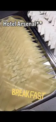 an escalator covered in sand with white seats at Hotel Arsenal in Nesebar
