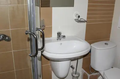 a bathroom with a sink and a toilet at Galateya Sveti Vlas Bułgaria in Sveti Vlas