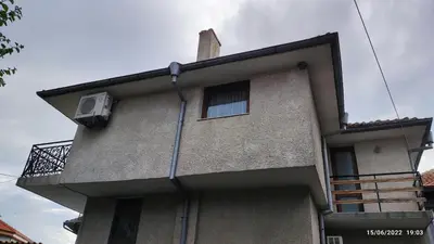 a building with a air conditioner on the side of it at апартамент Росен in Nesebar
