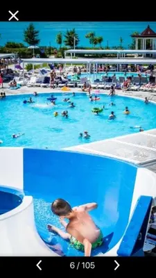 two pictures of people in a swimming pool at Private Apartment 49 in Prestige Fort Beach Hotel in Sveti Vlas