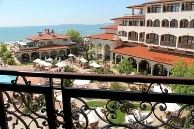 a view from a balcony of a building with a patio at Helena Sands in Sunny Beach