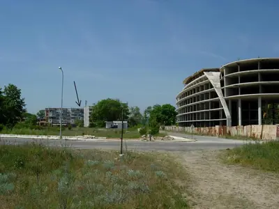 a building on the side of a road at Апартамент Флора - гр.Приморско ММЦ in Primorsko
