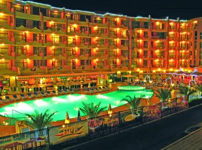a large hotel with a large pool in front of it at Grenada Hotel in Sunny Beach