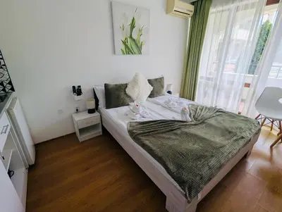 a bedroom with a bed in a room at CHATEAU DEL MAR C31a Studio Sunny Beach in Sunny Beach