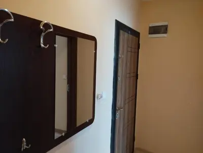 a mirror in front of a door in a bathroom at CITY STAY in Varna 2 in Varna City
