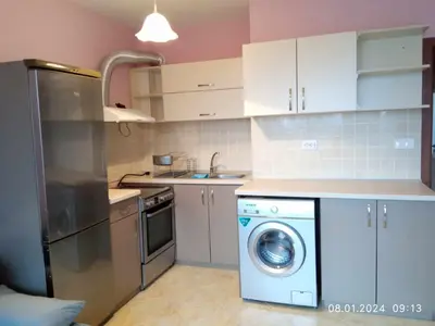 a kitchen with a washing machine and a sink at CITY STAY in Varna 2 in Varna City