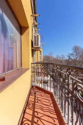 a balcony of a building with a window at СТАИ ЗА ГОСТИ ХАН КРУМ in Burgas City
