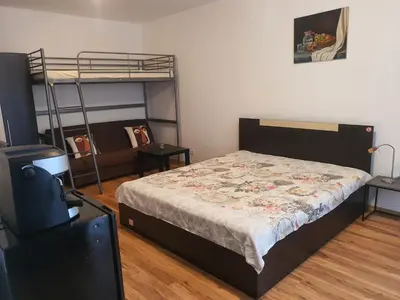 a bedroom with a bed and a bunk bed at Apartments Paskalina in Byala