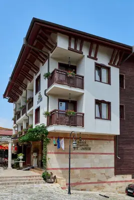 a building with balconies and plants on it at Hotel Saint John Baptist Nessebar in Nesebar