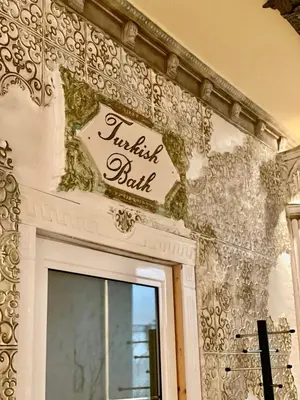 a sign on a wall above a door at Duni Marina Royal Palace Hotel - Ultra All Inclusive in Sozopol