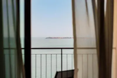 a view of the ocean from a window at Secrets Sunny Beach Resort and Spa - Premium All Inclusive - Adults Only in Sunny Beach