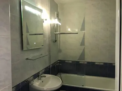 a bathroom with a sink and a bath tub at Vista Del Mar Ap 22 in Ravda