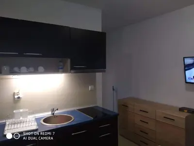 a bathroom with a sink and a counter top at Blue Marine Ap 26 in Ravda