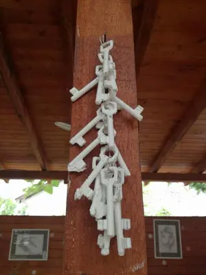 a group of four people on a wooden pole at Ethno guest suite in Primorsko