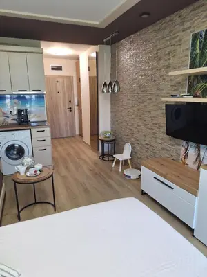 a room with a kitchen and a living room at Alex Studio, Sozopol, Kavaci in Sozopol