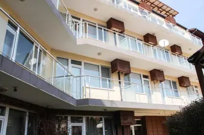 a large building with balconies on the side of it at Family apartment 