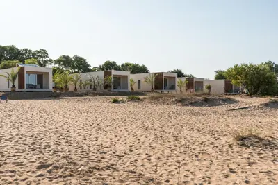 a row of houses on the beach at Camping Gradina in Sozopol