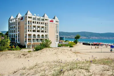 a hotel on the beach next to the beach at Viand Hotel - All Inclusive in Sunny Beach