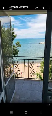 a view of the beach from the balcony of a condo at Студия първа линия Черноморец in Chernomorets