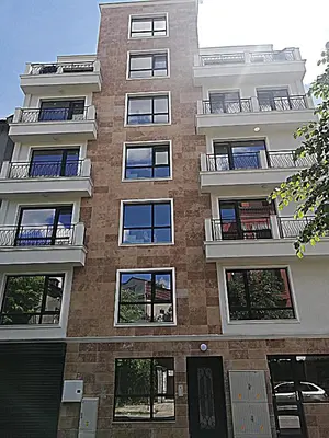 a tall building with balconies on the side of it at Ilarion 5 studio at Top Center in Varna City