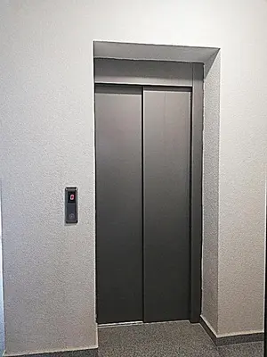 an elevator door in an office building at Ilarion 5 studio at Top Center in Varna City
