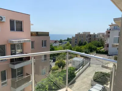 a balcony with a view of a city at Beautiful Sun Village with sea view in Byala