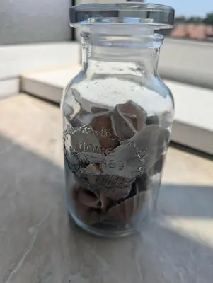 a glass jar filled with chocolate on top of a table at Sunny Cozy Flat in the Centre, close to beach, 4 rooms, 105sqm in Varna City