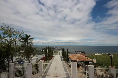 a view from the top of a building with a fence at Menada Apolon Apartments in Sozopol