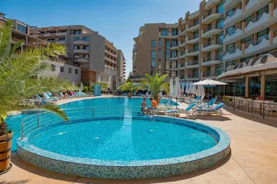 a swimming pool in the middle of a resort at Grenada - Menada Apartments in Sunny Beach
