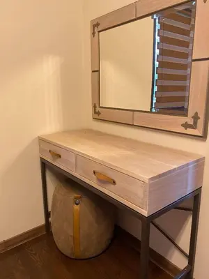 a wooden dresser with a mirror on top of it at Gradina Forest Villas in Sozopol